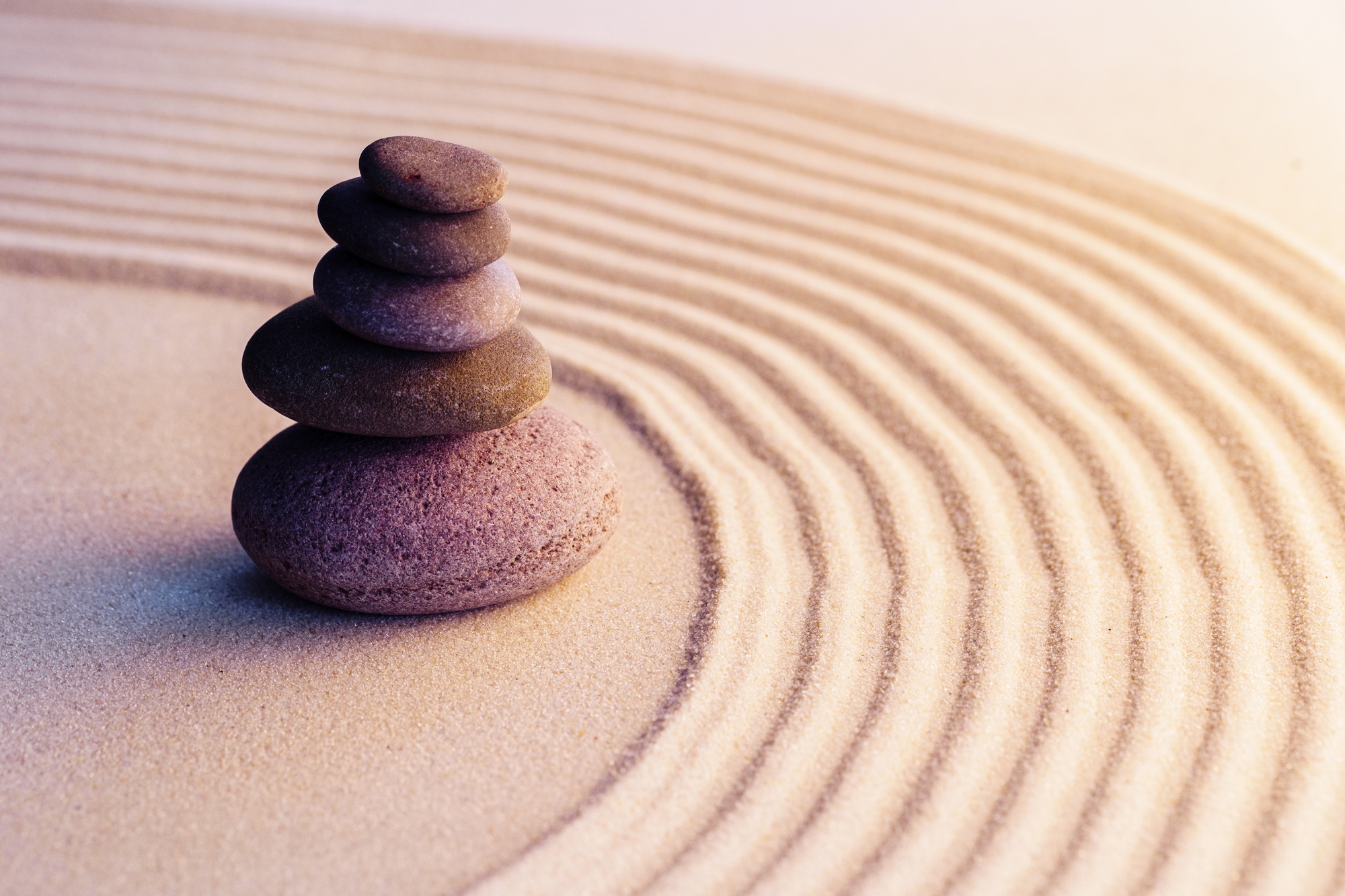 Meditation zen garden with stones on sand